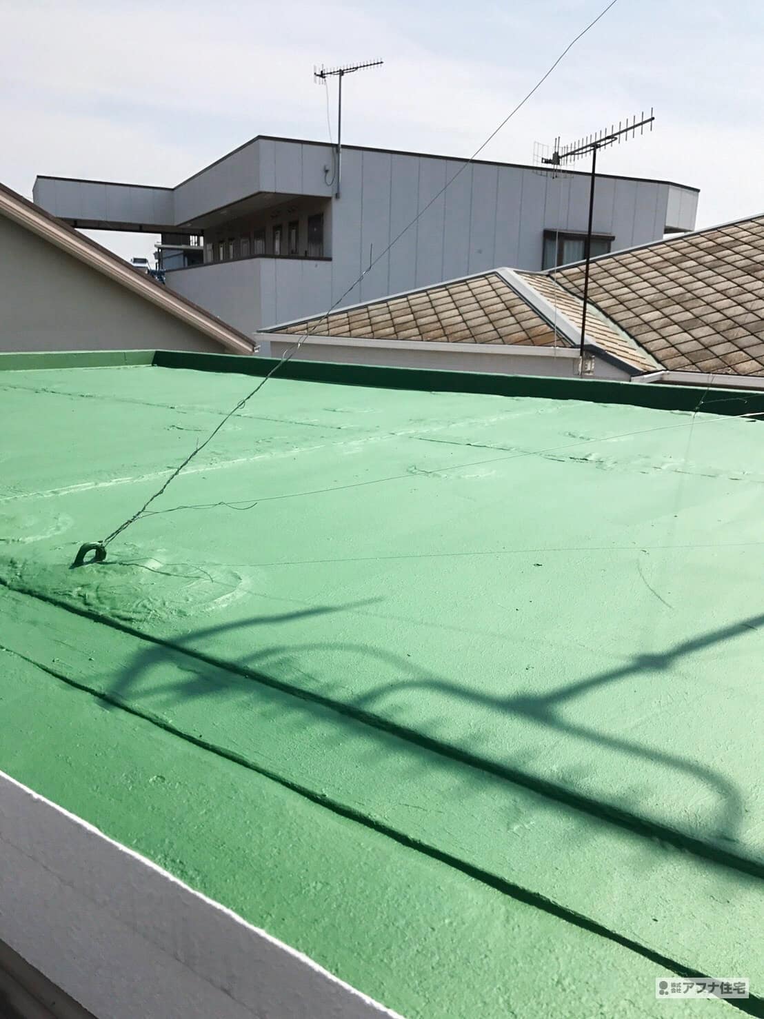 陸屋根側溝勾配つけ工事・屋上ウレタン防水塗装工事施工事例|アフナ住宅