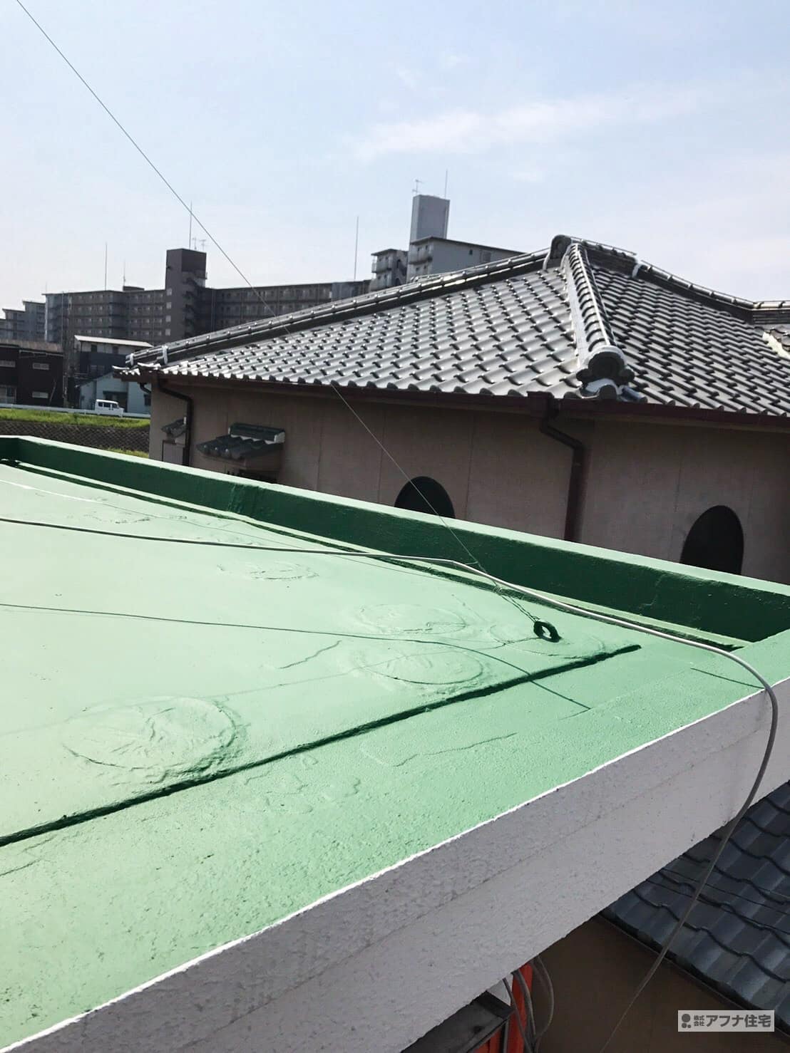 陸屋根側溝勾配つけ工事・屋上ウレタン防水塗装工事施工事例|アフナ住宅
